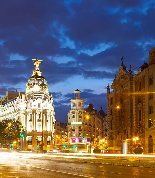 istock Street view of Madrid at night using long exposure  461980635