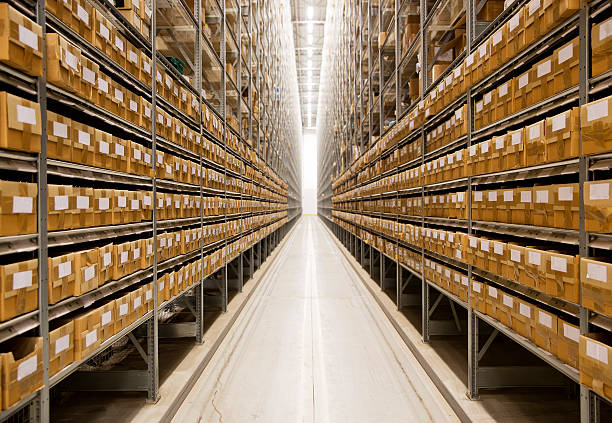 An image of long endless warehouse isle stock photo