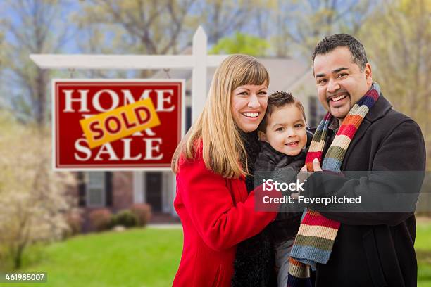 Family In Front Of Sold Real Estate Sign And House Stock Photo - Download Image Now - 30-39 Years, 40-49 Years, Adult