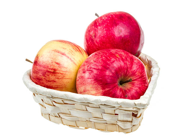 istock fresh red apples in the dish isolated on white background 461989199