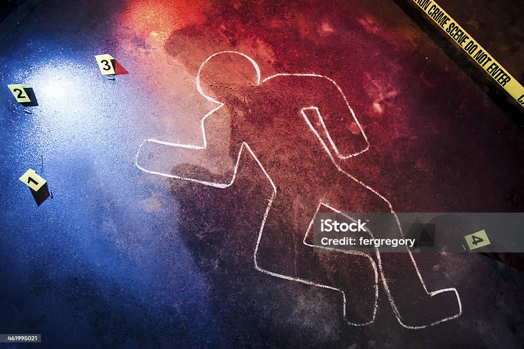 Chalk outline at a crime scene fresh crime scene at night Crime Scene Stock Photo