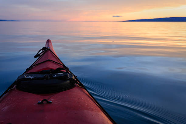 istock Kayak on water at sunset in Alaska 462002697