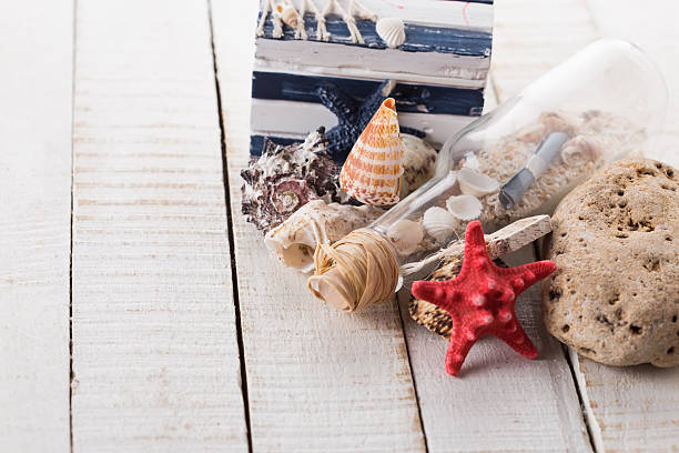 istock Seashells on wooden background. Summer concept. 462003711