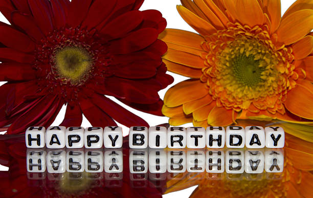 istock Happy birthday with red and yellow flowers 462004311