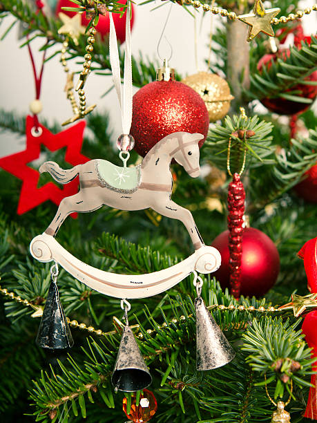 istock christmass horse with bells on tree & stars, balls 462007385