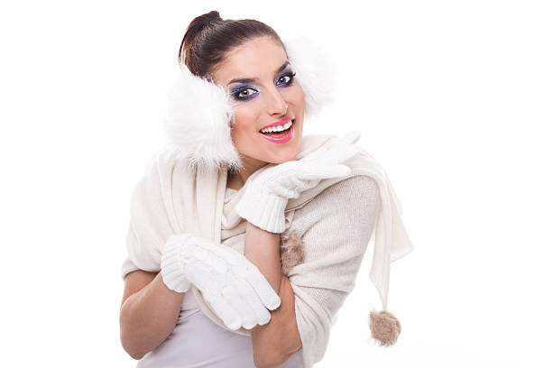 istock Beautiful brunette in white winter garments 462030735