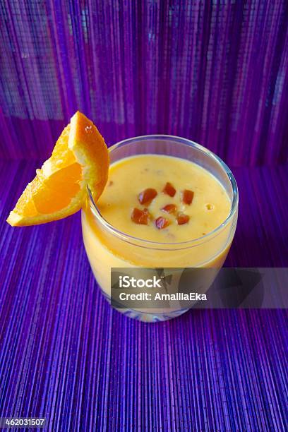 Mango Date Smoothie Stock Photo - Download Image Now - Colored Background, Date - Fruit, Drink