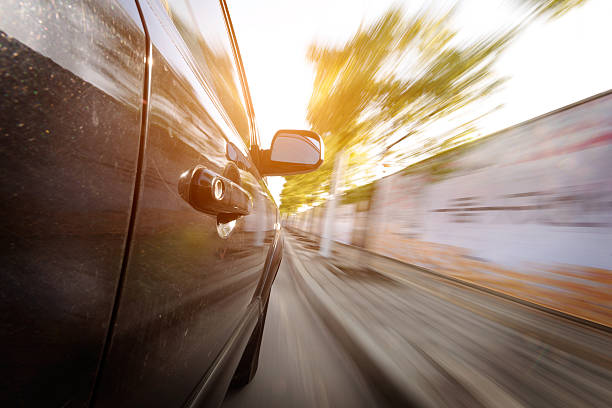 istock car on the road with motion blur background 462033211