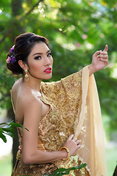 istock Younf woman wearing typical Thai dress 462033449