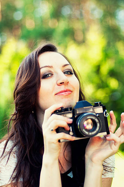 istock beautiful woman photographer 462033873