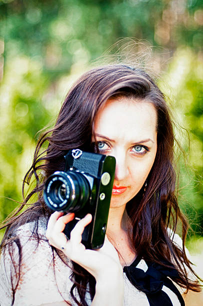 istock beautiful woman photographer 462033967