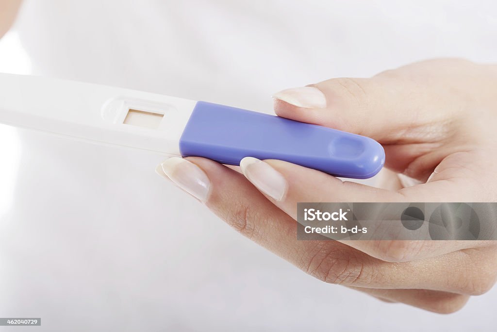 Close up on pregnancy test. Close up on pregnancy test in female's hands. Pregnancy Test Stock Photo