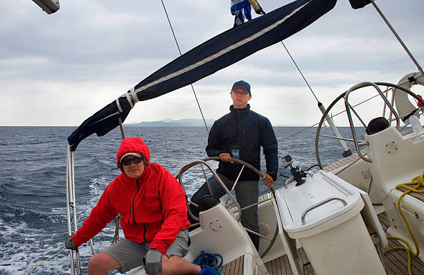 istock Captain controls the yacht. 462040787