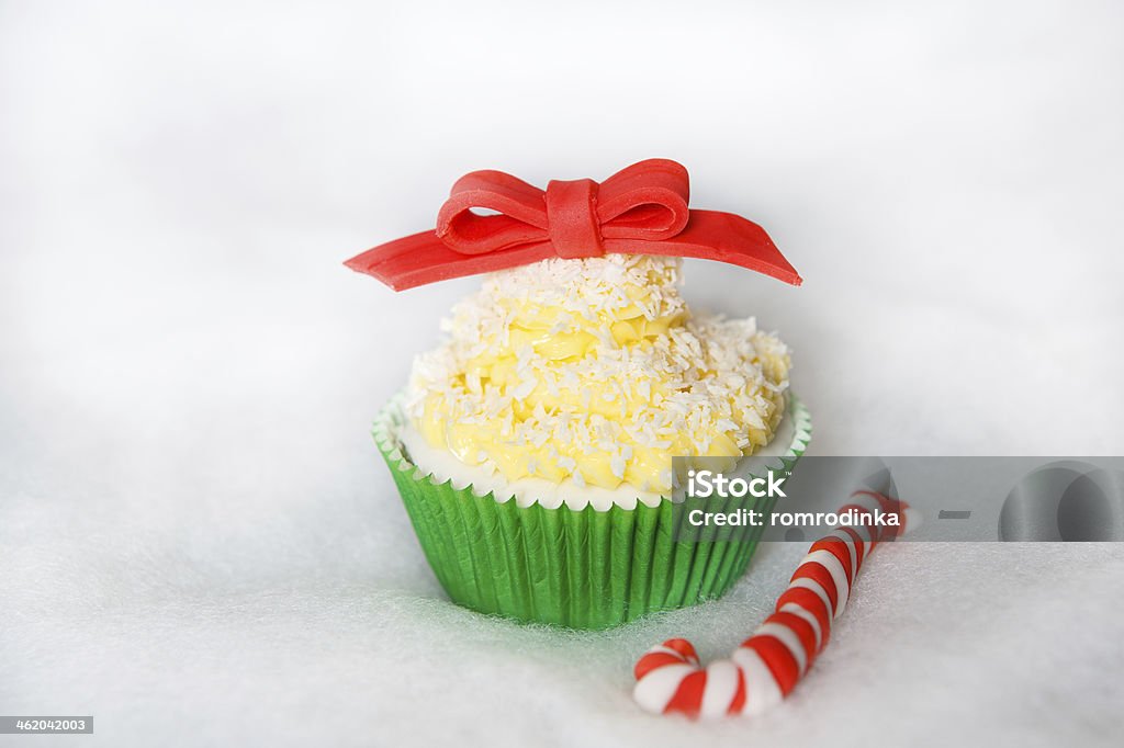Christmas cupcake with creme cheese and  fondant frosting Christmas cupcake with creme cheese, cocos and white fondant Baked Stock Photo