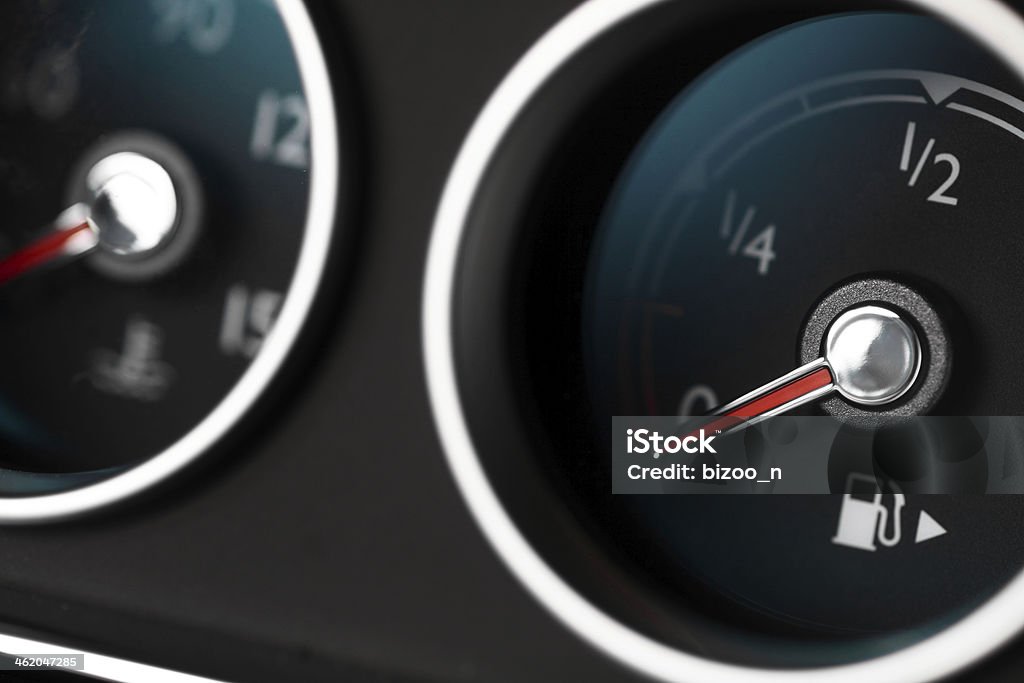 Fuel gauge Close-up shot of a fuel gauge in a car Car Stock Photo