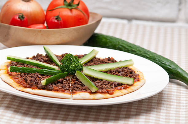 istock Turkish beef pizza with cucumber on top 462048379
