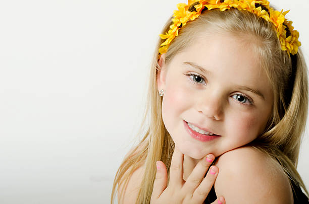 istock little girl whit flowers 462068951