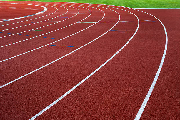 istock New running track with green grass abstract, texture, background. 462078311