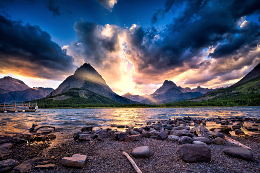 Colorful sunset over Swiftcurrent Lake in Glacier National Park, Montana