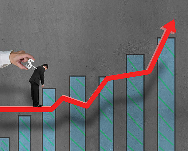 istock Businessman on growing trend with winder in back, another windering 462079813