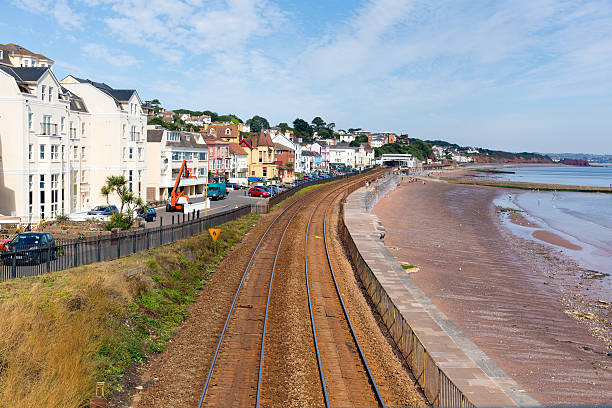 istock Dawlish Devon England with beach railway track and sea 462082463