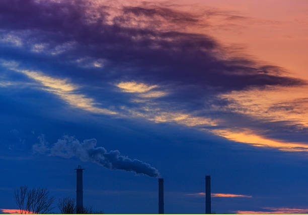 istock Heavy smoke spewed from coal powered plant 462083599
