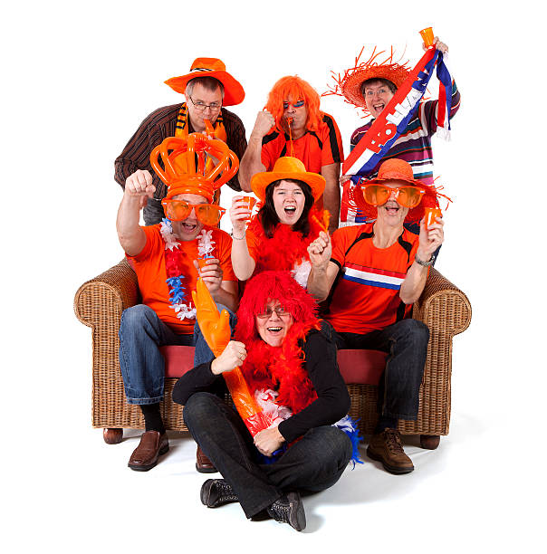 istock Group of Dutch soccer fan watching game over white background 462085237