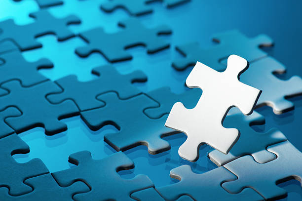 istock Closeup of unfinished jigsaw puzzle. 462090875