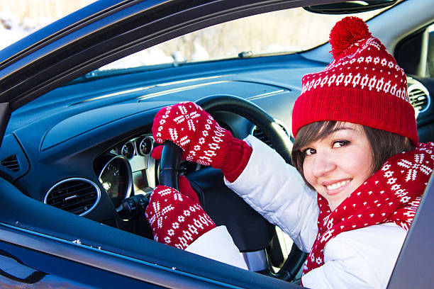 istock Woman driving a car in winter 462091567