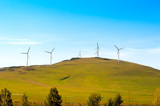 istock Wind turbine against mountain 462095871