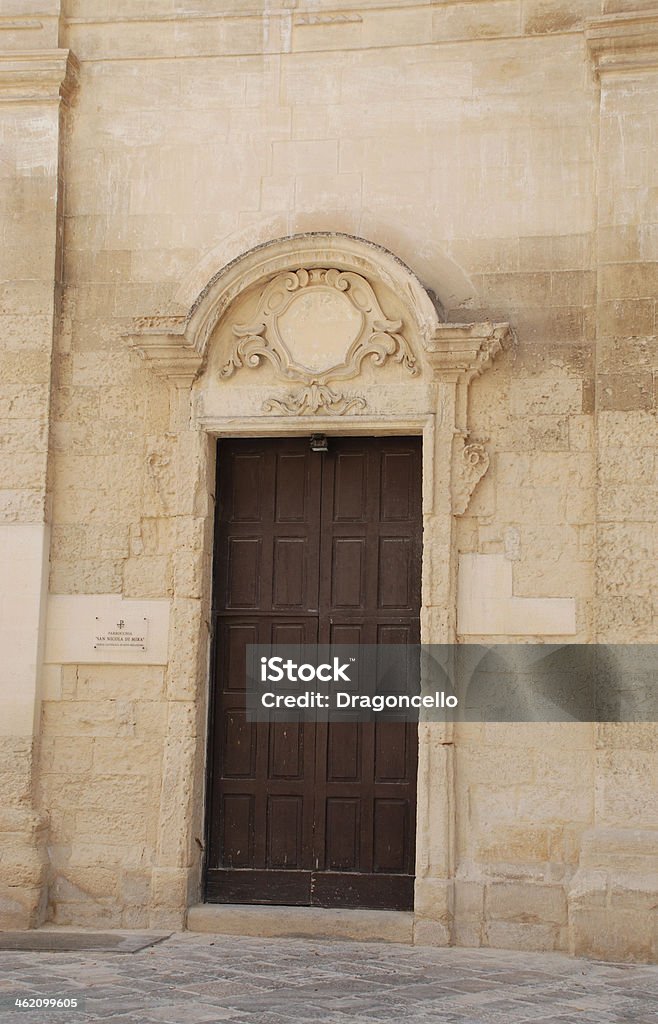 Door of Basilica San Niccolo dei Greci The door of the 18th century Basilica San Niccolo dei Greci in the southern Italian city of Lecce. 18th Century Stock Photo