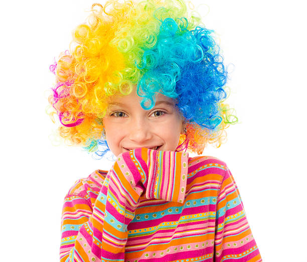 istock little girl in clown wig 462101749