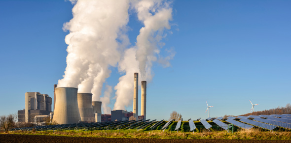 Power plant, field of photovoltaic panels and wind turbines, Germany