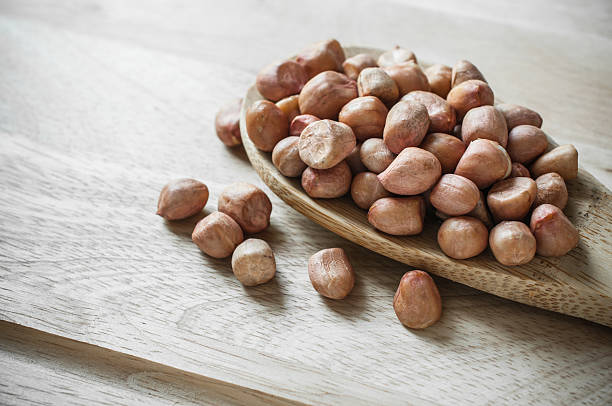 istock Peanuts closeup on wood ladle 462113563