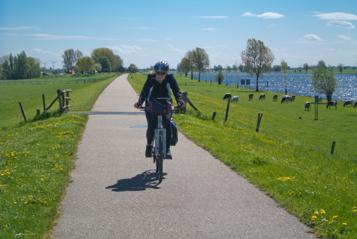 a woman is cycling in the Netherlands