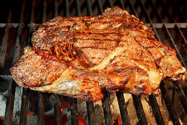 istock Tenderloin steak on BBQ grill XXXL 462118955