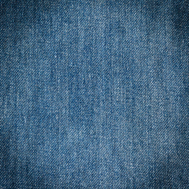 istock old blue jeans background and texture close up 462119261