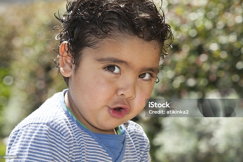 portrait of a cute toddler cute toddler making funny faces Baby - Human Age Stock Photo