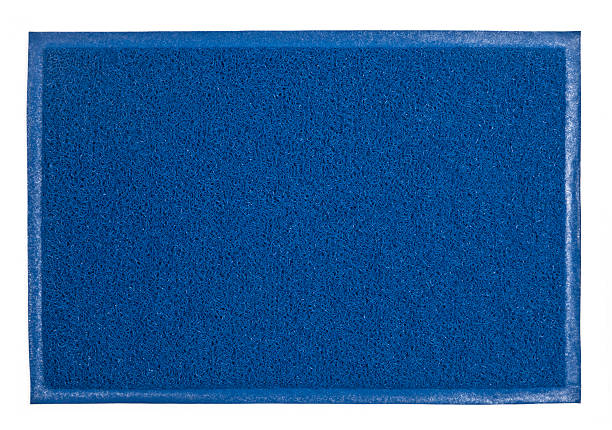 Close-up image of a blue fuzzy soft carpet
