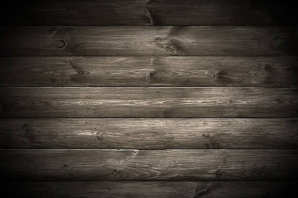 istock Spotlight on Dark Wooden Wall 462136687