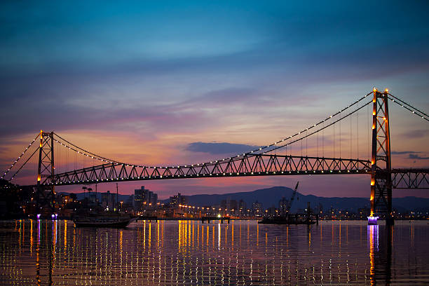 Bridge at Sunset The Hercilio Luz Bridge, in Florianopolis, Brazil, with an amazing sunset. florianópolis stock pictures, royalty-free photos & images