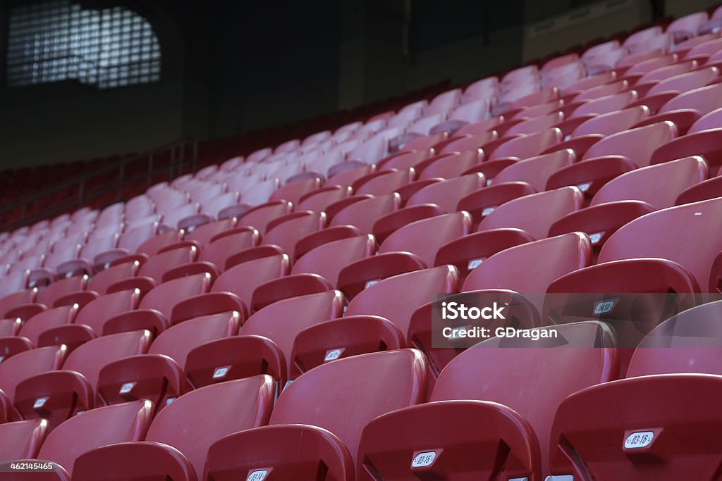 Seats Red plastic stadium seats. Arranging Stock Photo