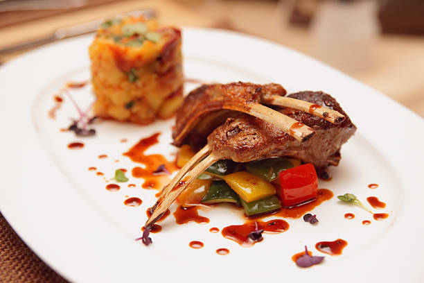 istock Grilled rack of lamb with potatoes and vegetables 462152257