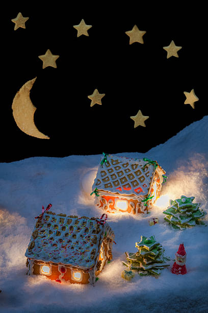istock Gingerbread cottage in winter with stars 462153927