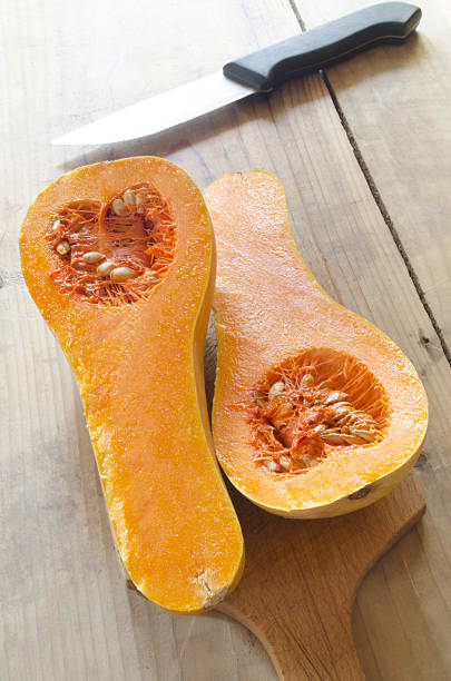 istock butternut pumpkin on a wooden board 462154517