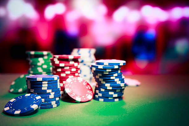 Casino chips on gaming table stock photo
