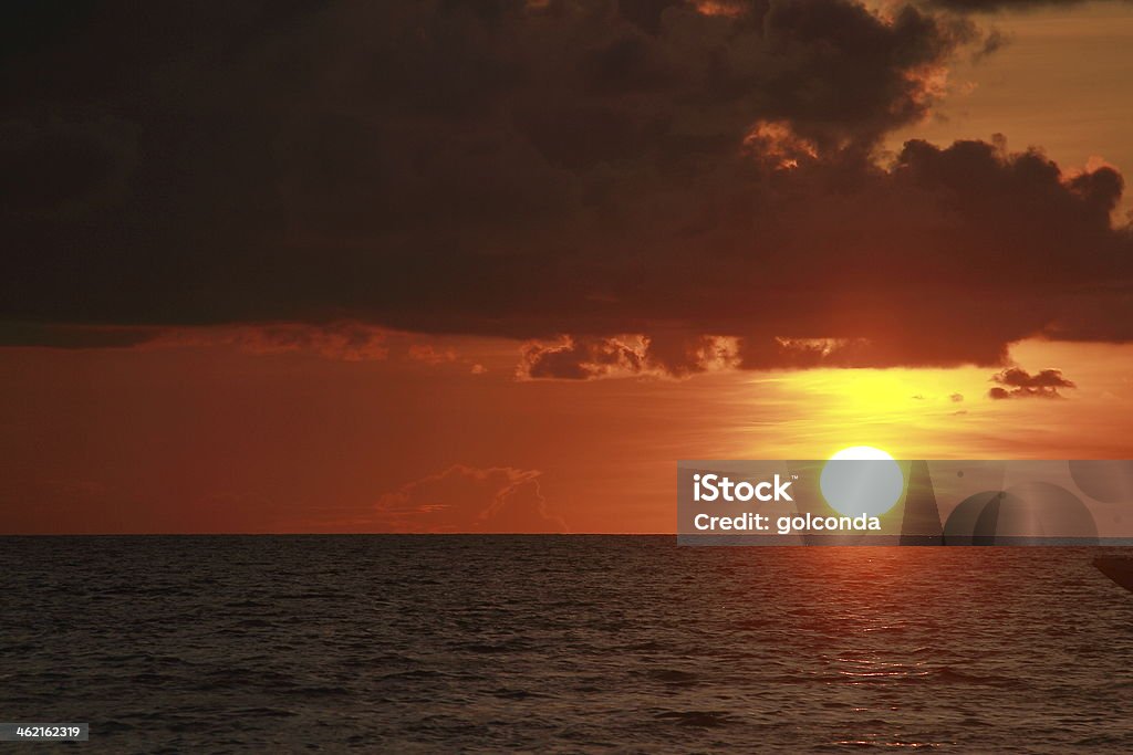 sun set on the sea orage red color sunset Beach Stock Photo