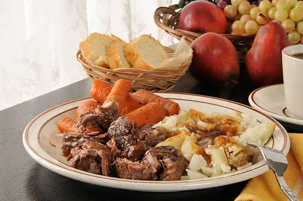 Slow roasted pot roast with potatoes and carrots