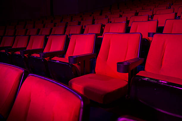 istock Rows of empty red theater seats 462166231