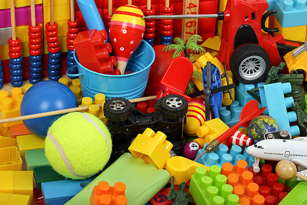 colorful toys variety of toys and childhood items tennis ball container stock pictures, royalty-free photos & images